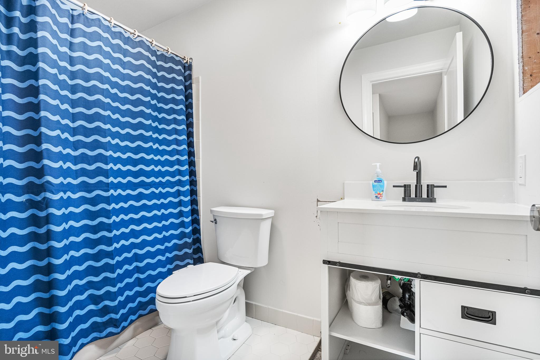 14 Taunton Road Medford, NJ 08055 - Photo 32 of 47 a bathroom with a toilet and a sink
