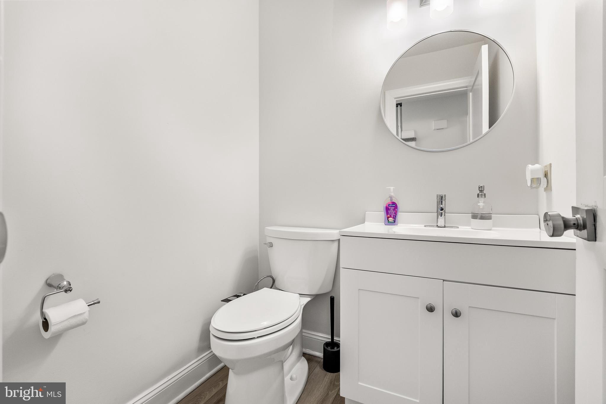 14 Taunton Road Medford, NJ 08055 - Photo 35 of 47 a bathroom with a sink mirror and toilet
