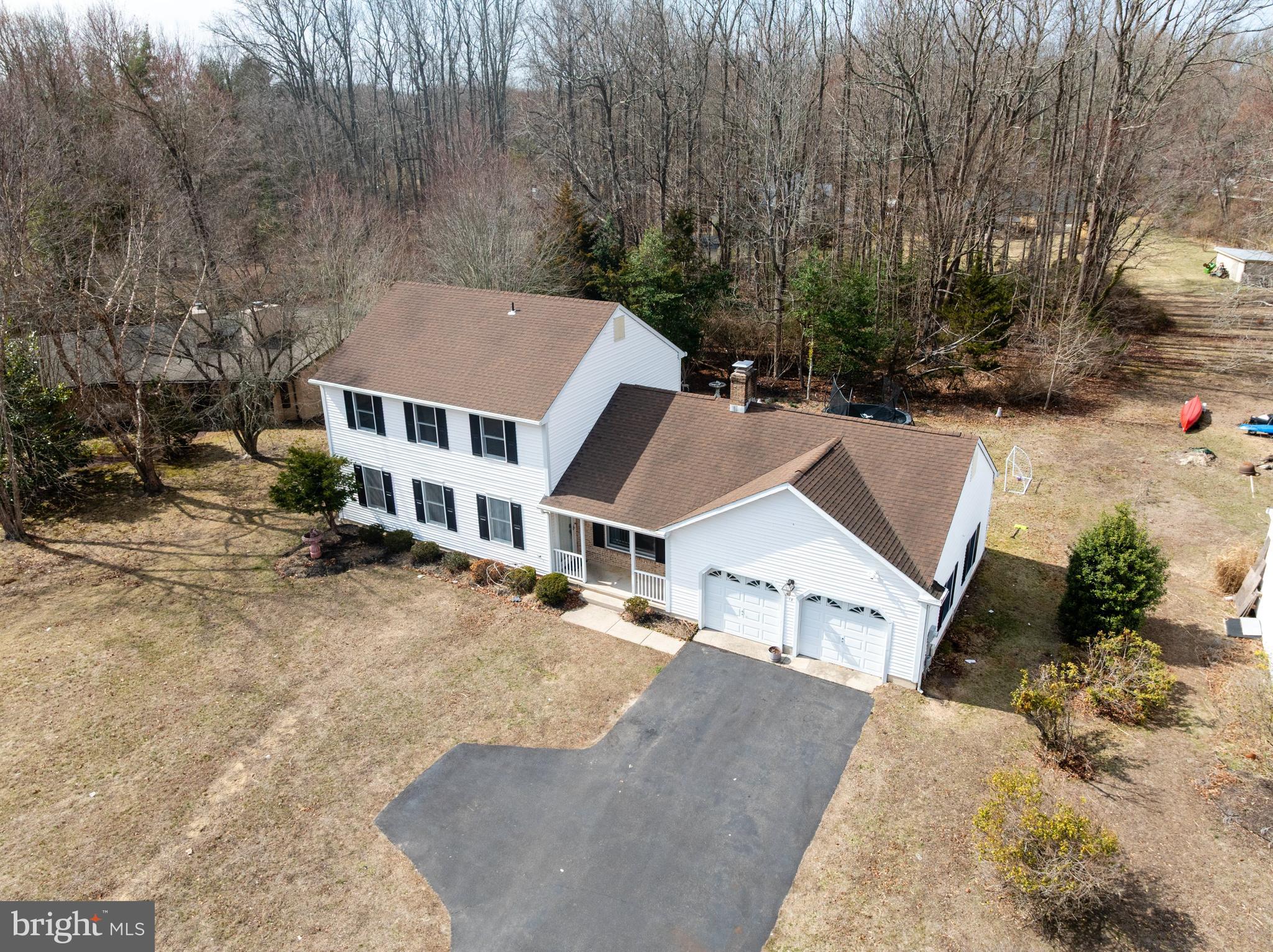 14 Taunton Road Medford, NJ 08055 - Photo 5 of 47 front view of a house with a yard