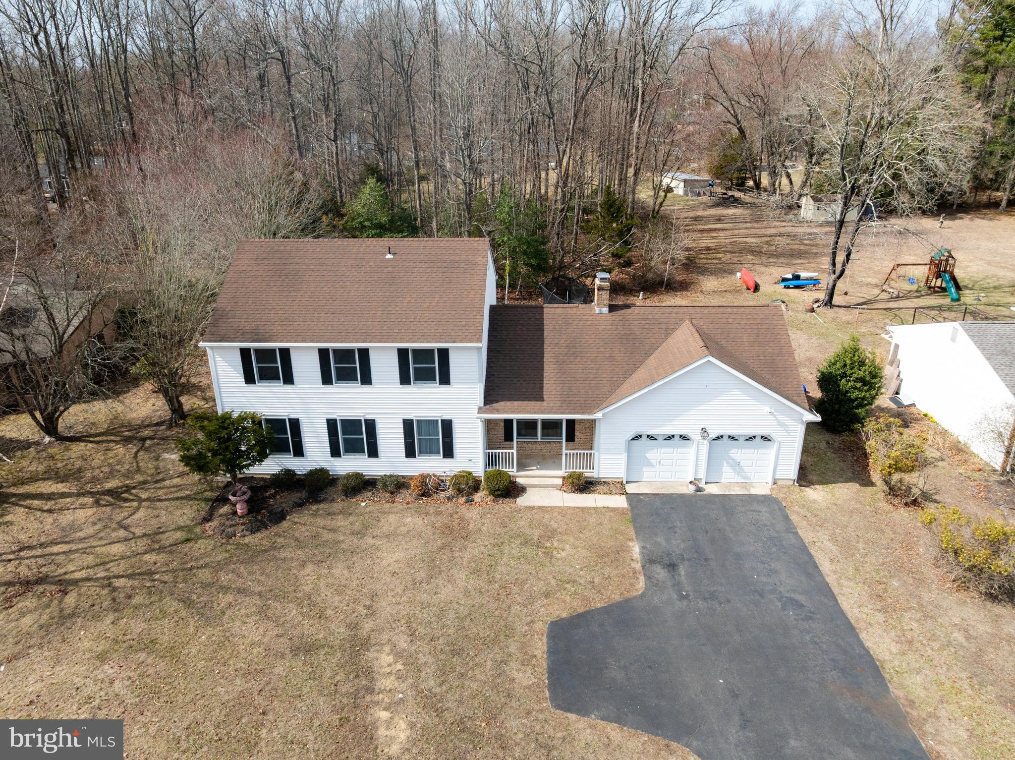 14 Taunton Road Medford, NJ 08055 - Photo 6 of 47 a view of a town with houses