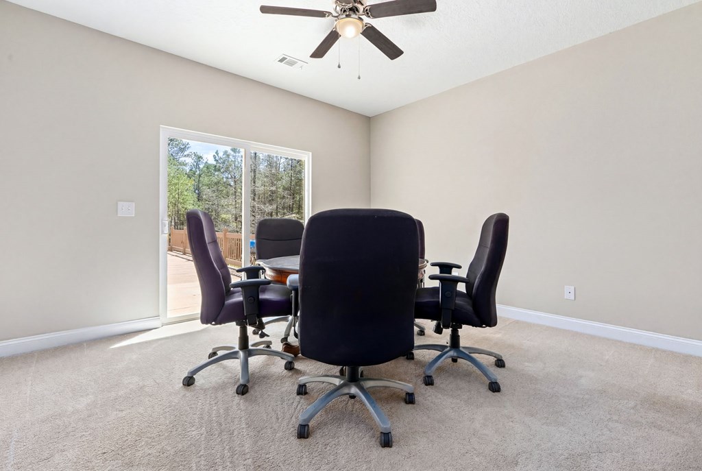 934 Ga Highway Fortson, GA 31808 - Photo 14 of 19 a view of a workspace with furniture and a window