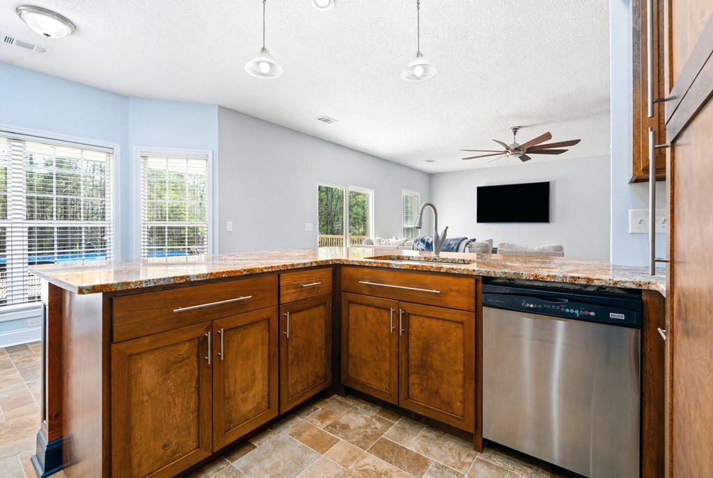 934 Ga Highway Fortson, GA 31808 - Photo 5 of 19 a kitchen with stainless steel appliances granite countertop a sink and a stove