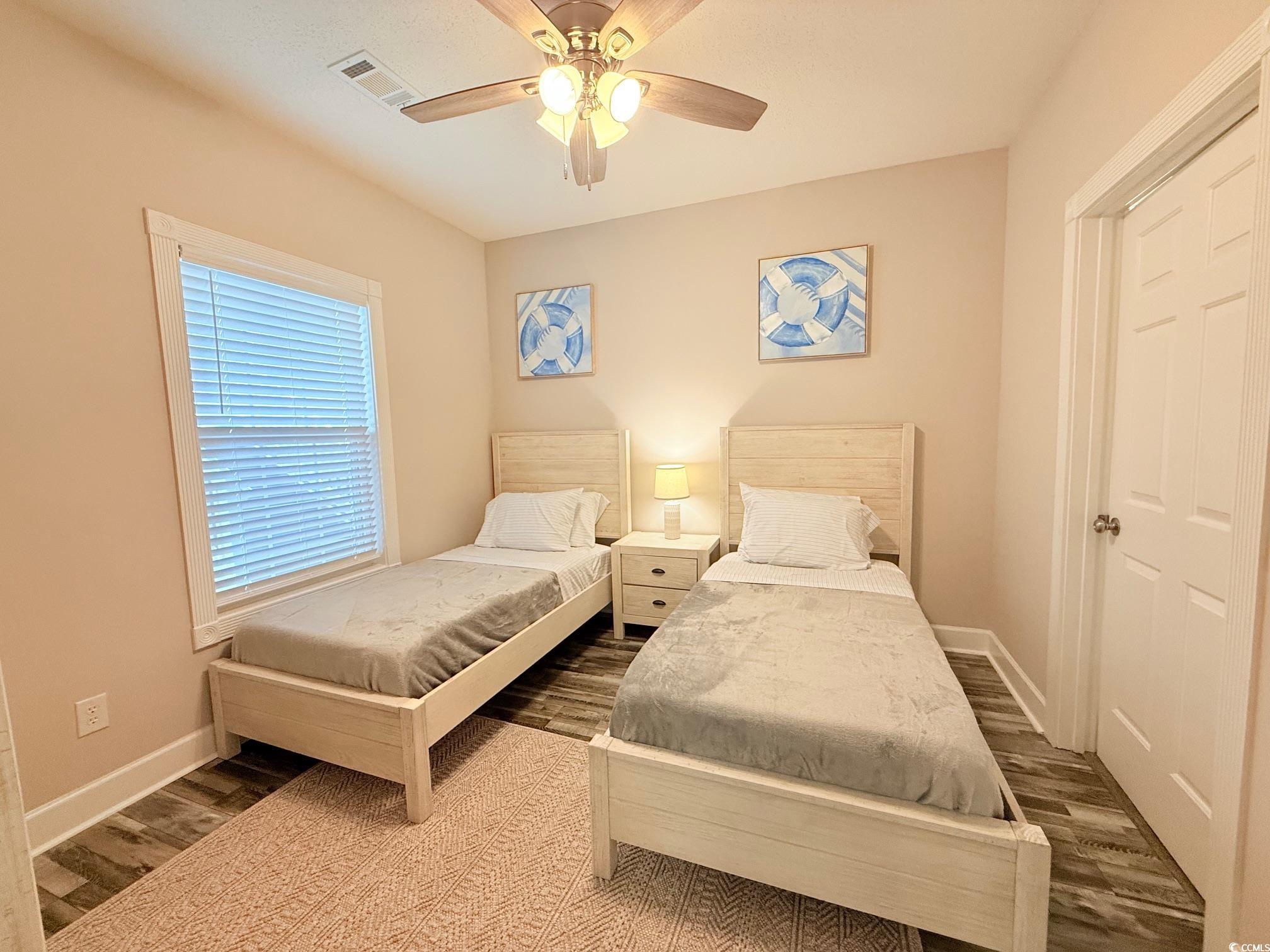4860 Carnation Circle, Unit 17105 Myrtle Beach, SC 29577 - Photo 17 of 29 Bedroom featuring wood finished floors and ceiling fan