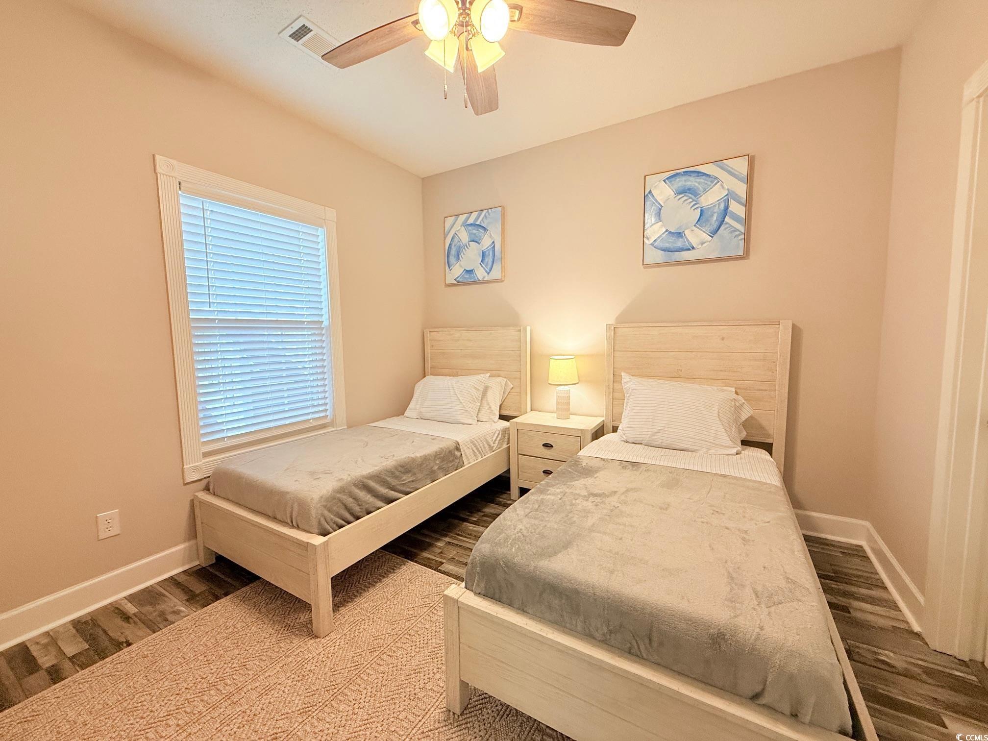 4860 Carnation Circle, Unit 17105 Myrtle Beach, SC 29577 - Photo 18 of 29 Bedroom with wood finished floors and a ceiling fan