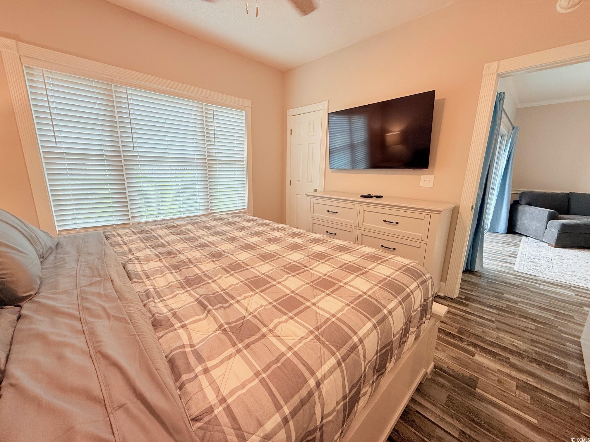4860 Carnation Circle, Unit 17105 Myrtle Beach, SC 29577 - Photo 22 of 29 Bedroom featuring dark wood finished floors and ceiling fan