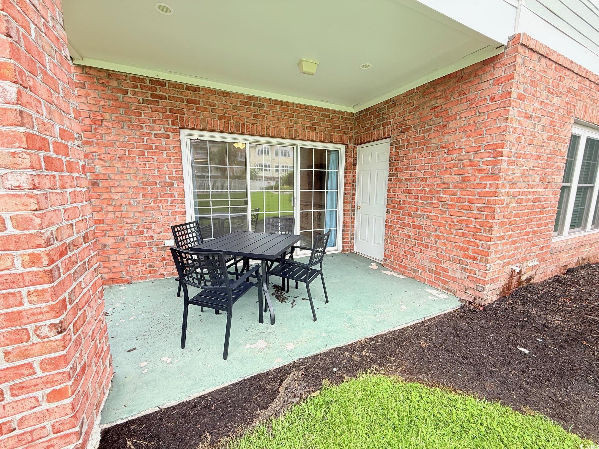 4860 Carnation Circle, Unit 17105 Myrtle Beach, SC 29577 - Photo 26 of 29 View of patio with outdoor dining space