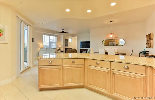 a kitchen with cabinets a sink and appliances