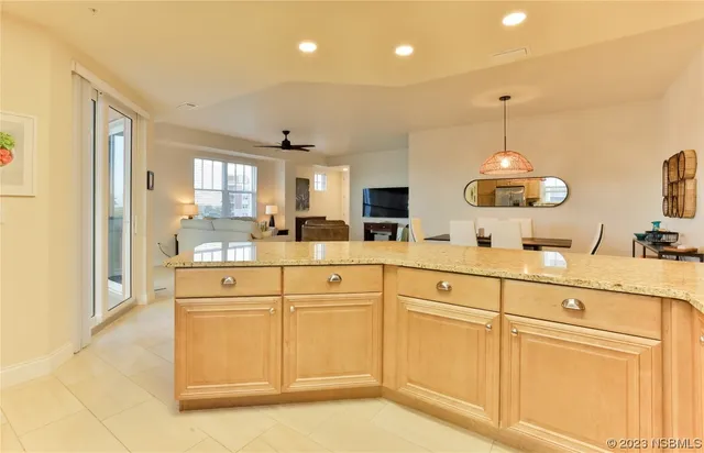 a kitchen with cabinets a sink and appliances