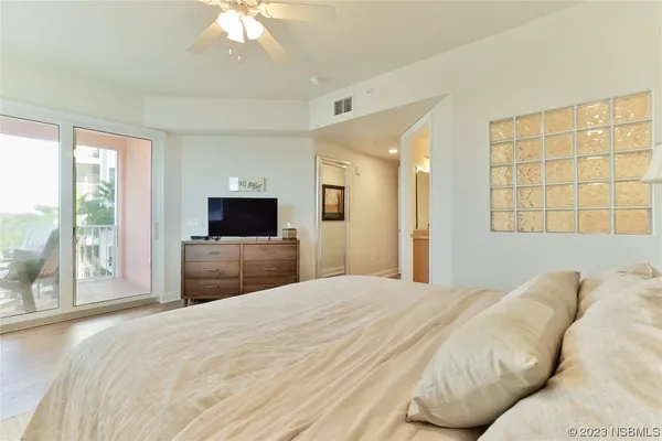 a view of balcony with furniture