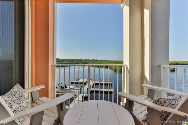 a view of a lake with a outdoor space