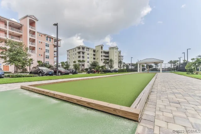 a view of a swimming pool with a lake view