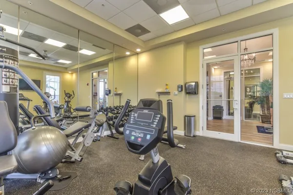 a view of a room with gym equipment