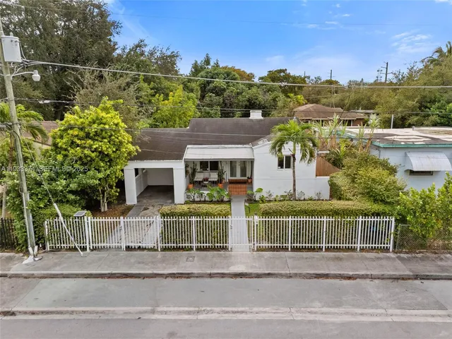 front view of a house with a street