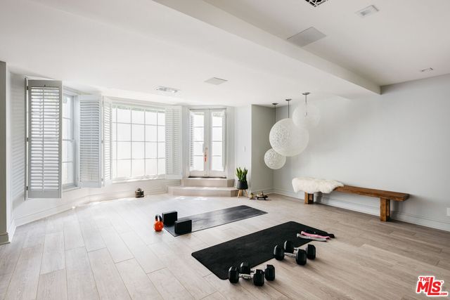 a very nice looking room with a large window and a couch