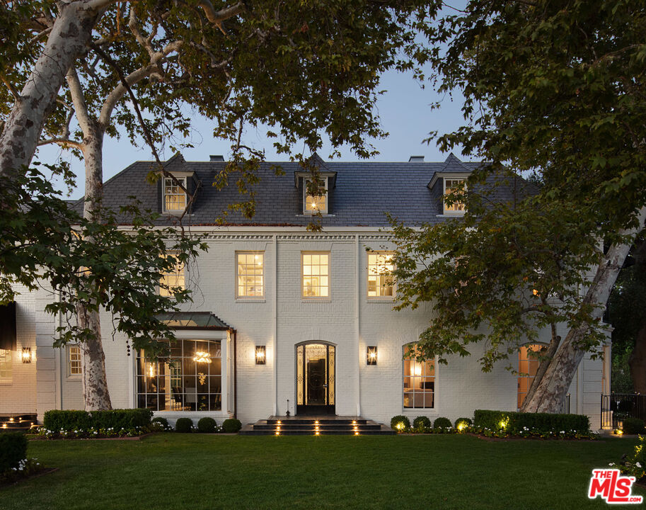 301 Copa De Oro Road Los Angeles, CA 90077 - Photo 30 of 33 front view of house with a yard