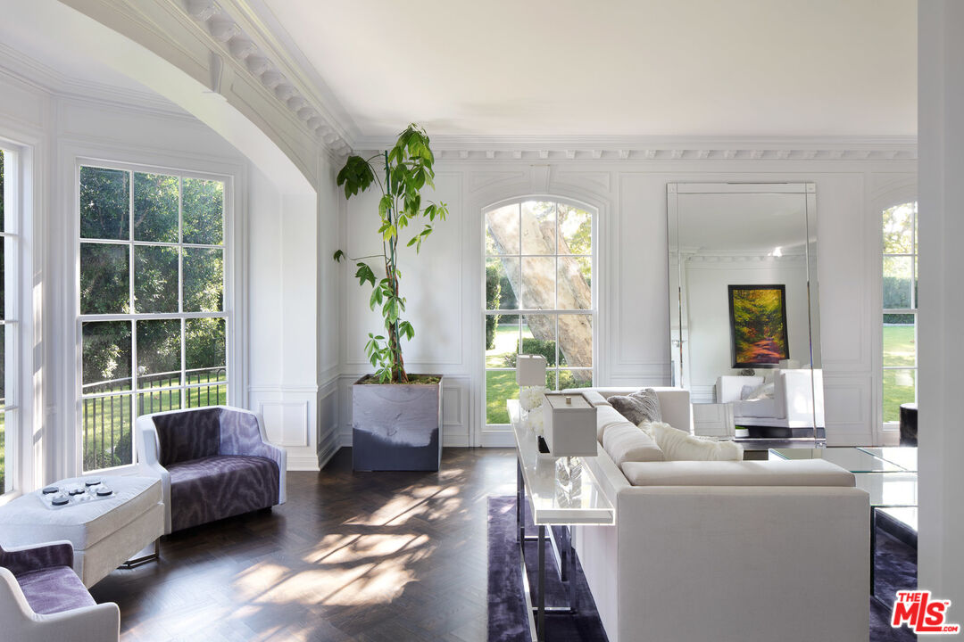 301 Copa De Oro Road Los Angeles, CA 90077 - Photo 9 of 33 a living room with furniture and a large window