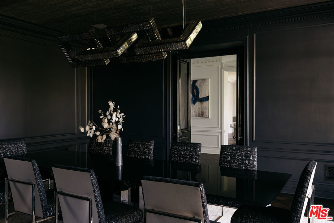 301 Copa De Oro Road Los Angeles, CA 90077 - Photo 10 of 33 a front view of a house with dining space