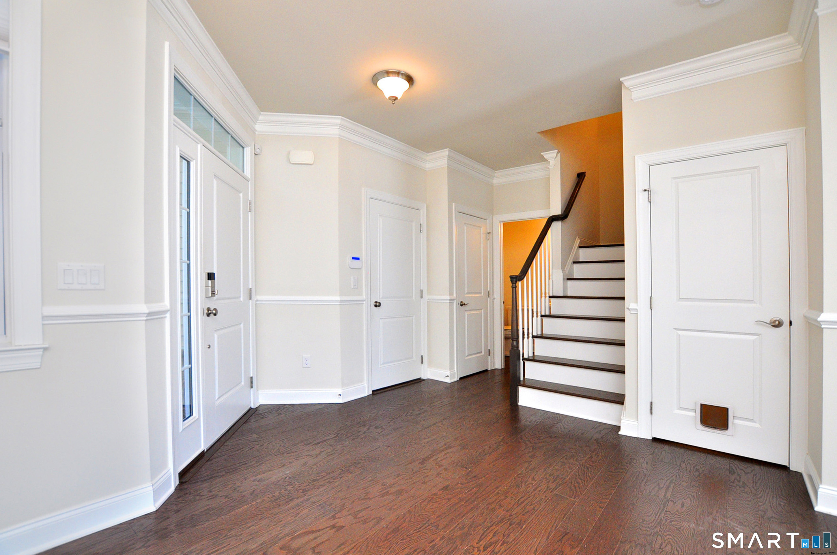 149 Ridgewood Drive Middlebury, CT 06762 - Photo 6 of 30 a view of entryway with wooden floor