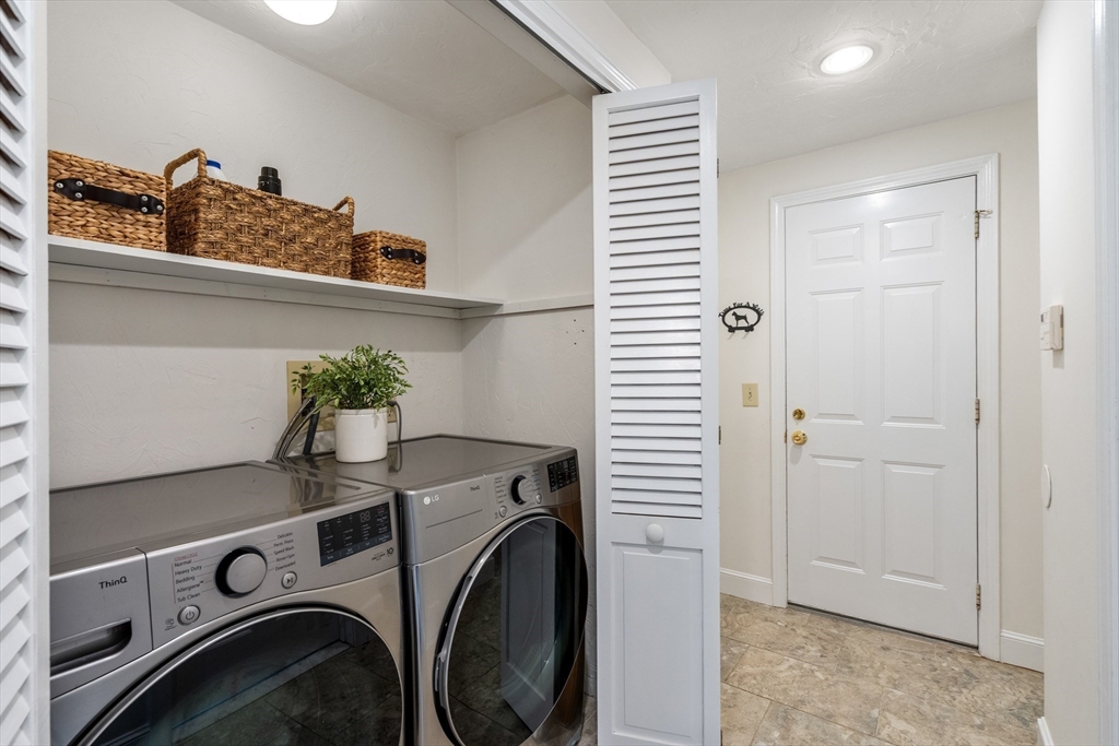 322 Concord Road Wayland, MA 01778 - Photo 11 of 35 a utility room with dryer and washer