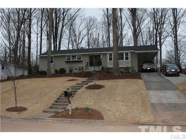 721 Catawba Street Raleigh, NC 27609 - Photo 1 of 13 This is a picture from when the yard was first landscaped. Landscaping mature now. Used so you can see the house.