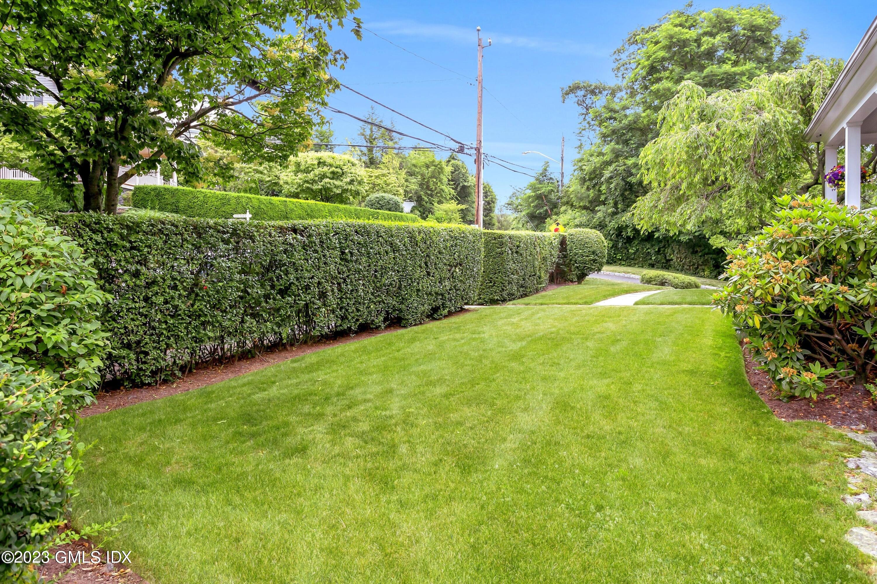 124 East Elm Street, Unit WEST Greenwich, CT 06830 - Photo 5 of 23 a view of yard with green space