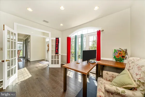 a kitchen with a sink stainless steel appliances and cabinets