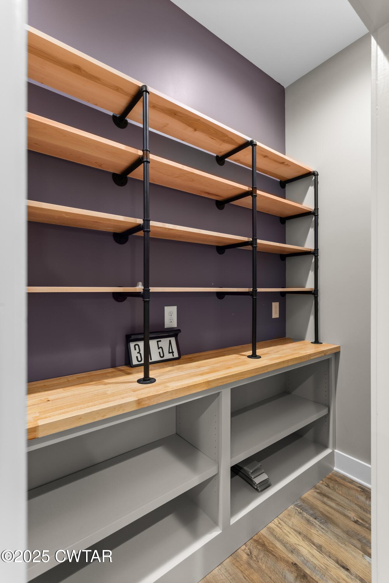 3154 Dodson Gap Road Culleoka, TN 38451 - Photo 14 of 36 a view of a room with shelves and wooden floor