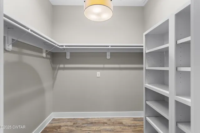 a view of an empty room with empty racks