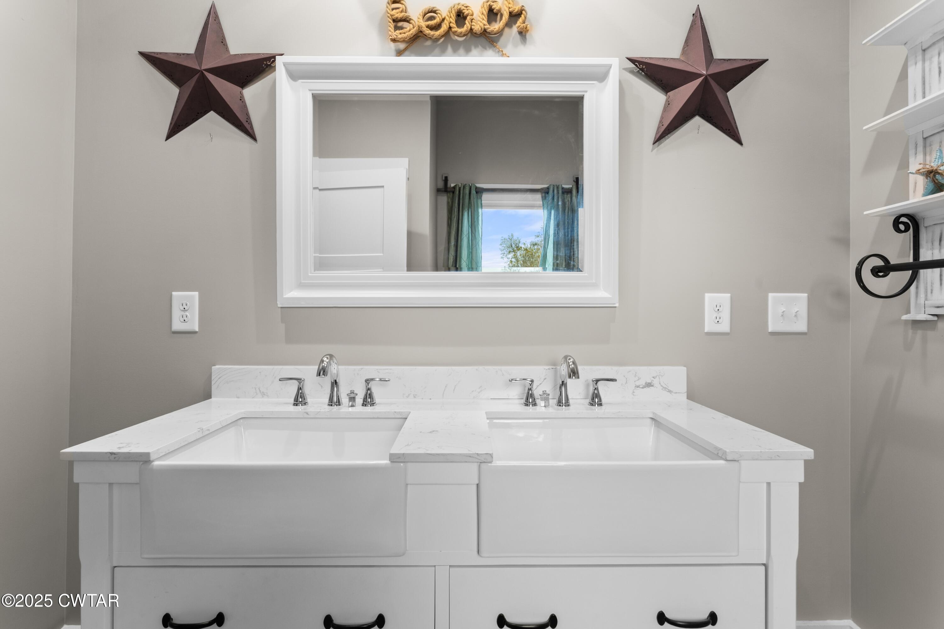 3154 Dodson Gap Road Culleoka, TN 38451 - Photo 20 of 36 a bathroom with a sink and a mirror