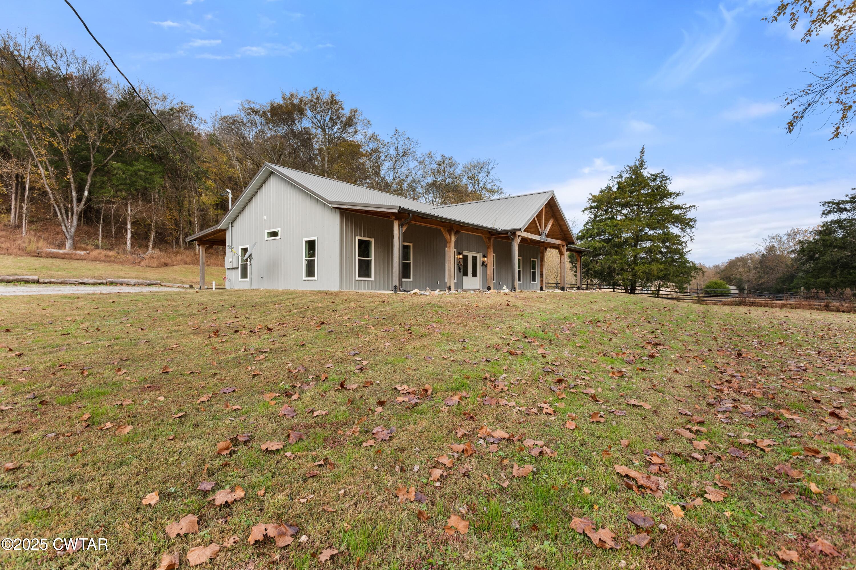 3154 Dodson Gap Road Culleoka, TN 38451 - Photo 2 of 36 a view of a house with a yard