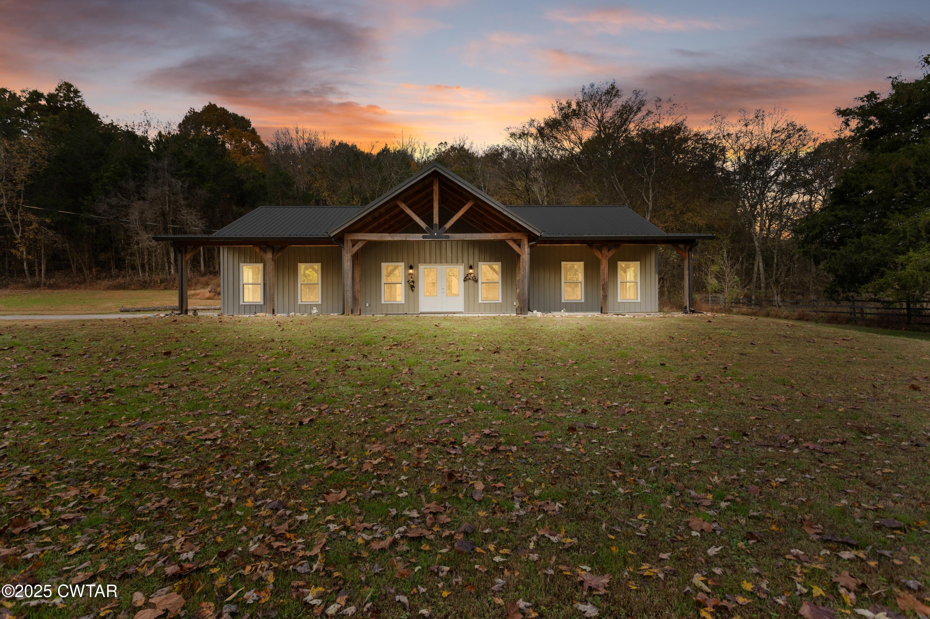 3154 Dodson Gap Road Culleoka, TN 38451 - Photo 36 of 36 a front view of a house with a yard