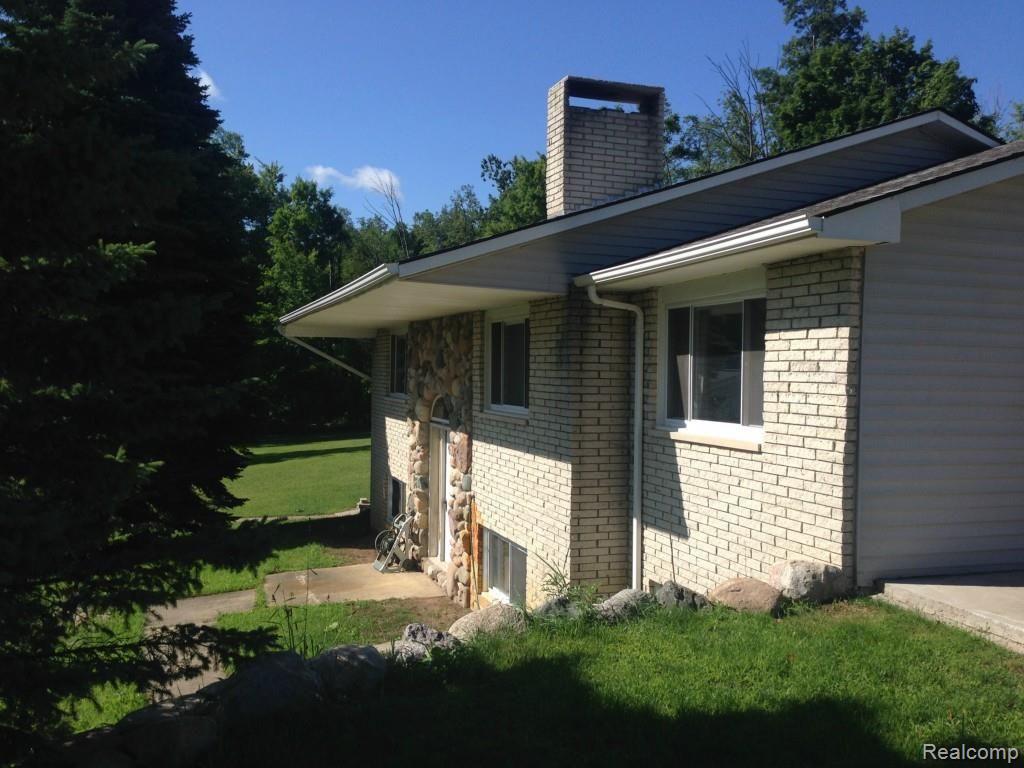 1731 West Leonard Road Leonard, MI 48367 - Photo 2 of 78 Front side view