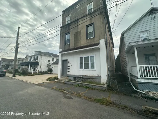 a front view of a house with windows