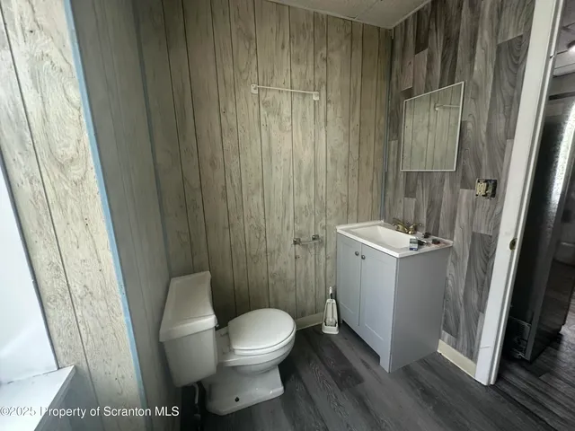 a bathroom with a bathtub and shower