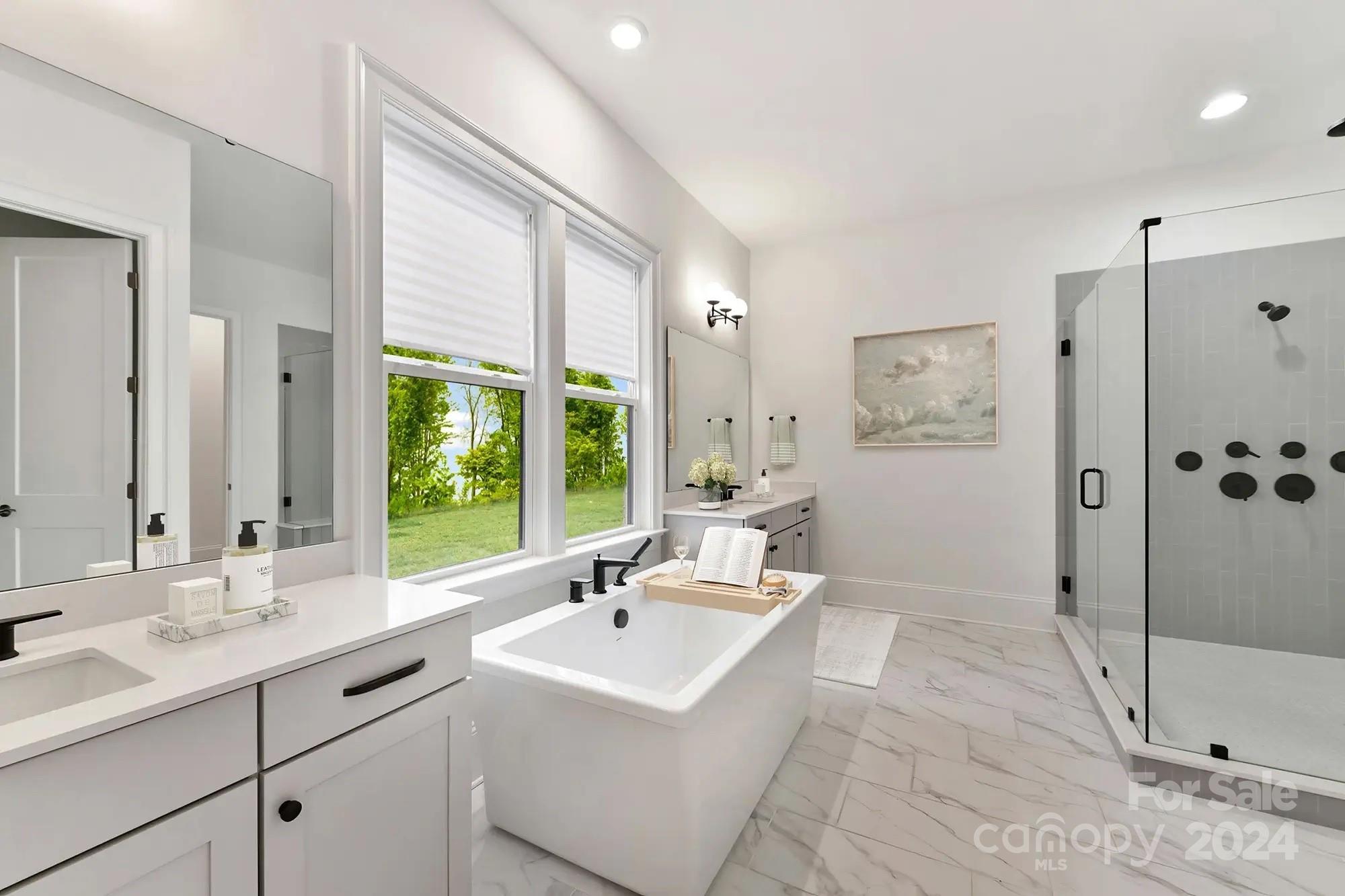 1318 Pomar Circle Marvin, NC 28173 - Photo 11 of 22 a bathroom with a shower sink and mirror