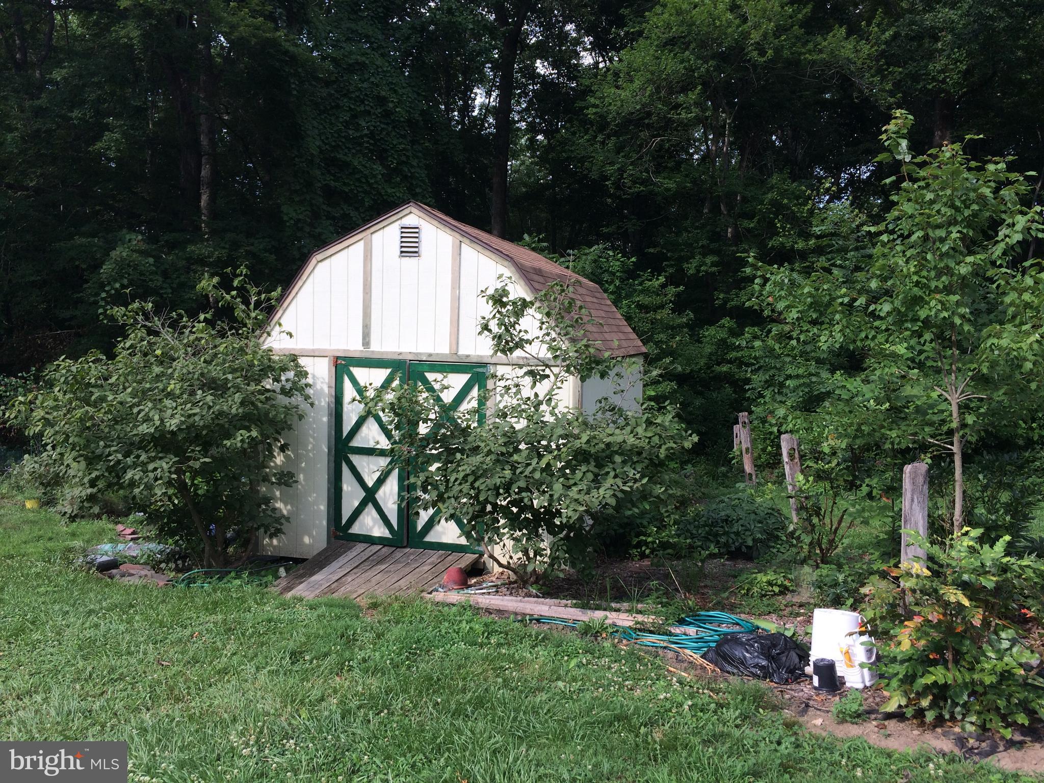 5861 Cari Road Huntingtown, MD 20639 - Photo 18 of 27 Shed with Loft