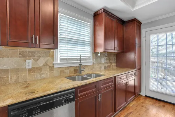 a kitchen with a stove and a microwave