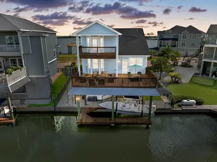 a view of a lake with a house