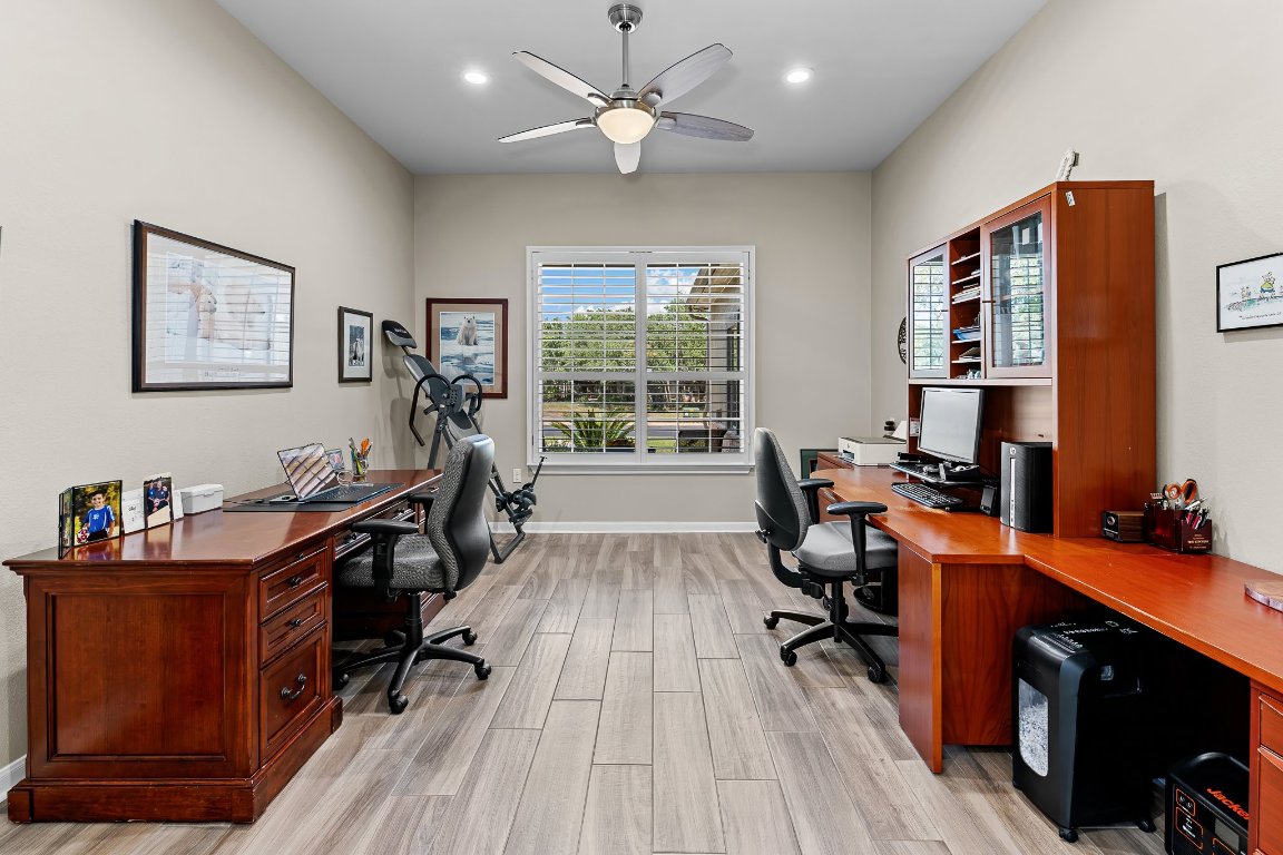 103 Trail Rider Way Georgetown, TX 78633 - Photo 14 of 39 a view of a workspace with furniture and a window