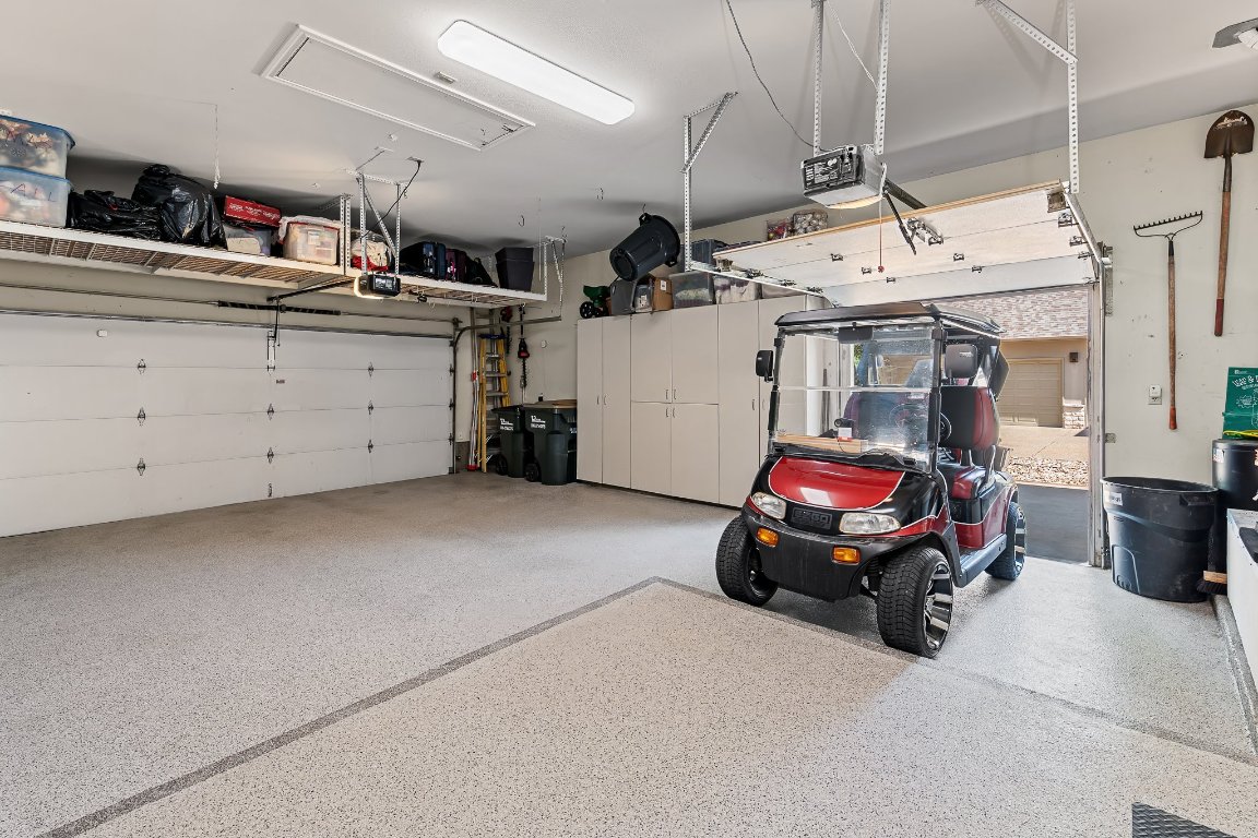 103 Trail Rider Way Georgetown, TX 78633 - Photo 36 of 39 a car parked in a garage