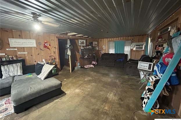 419 West Main Street Lometa, TX 76853 - Photo 2 of 16 a living room with furniture gym equipment and a large window