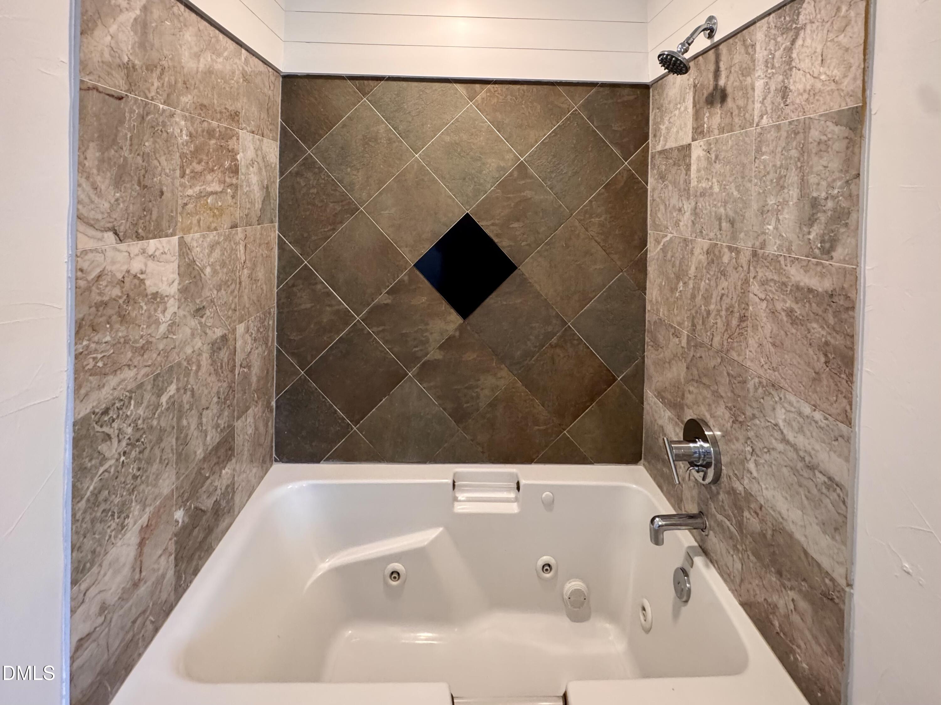 2204 Stafford Avenue, Unit 202 Raleigh, NC 27607 - Photo 11 of 15 a bathroom with a bathtub
