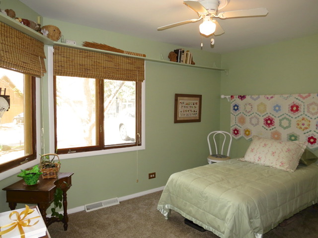 617 Spring Road Ingleside, IL 60041 - Photo 17 of 25 a bedroom with a bed and a window