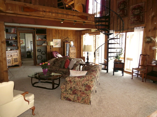 617 Spring Road Ingleside, IL 60041 - Photo 9 of 25 a living room with furniture and a floor to ceiling window