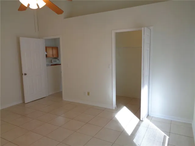 an empty room with windows