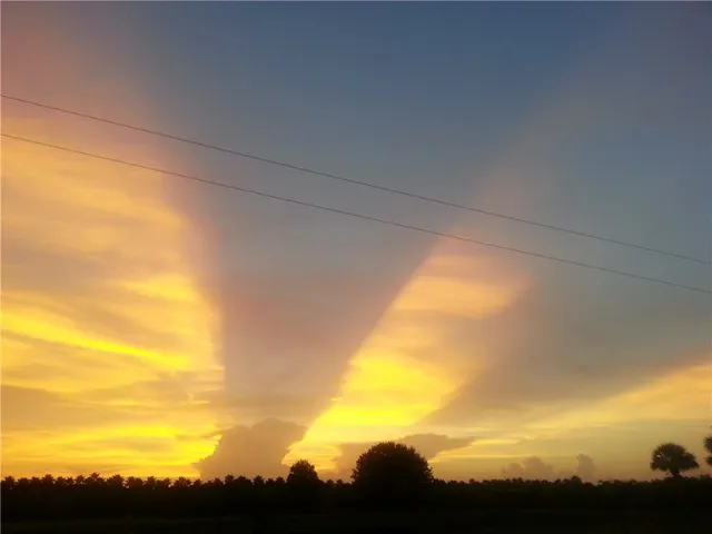 a view of balcony with yard