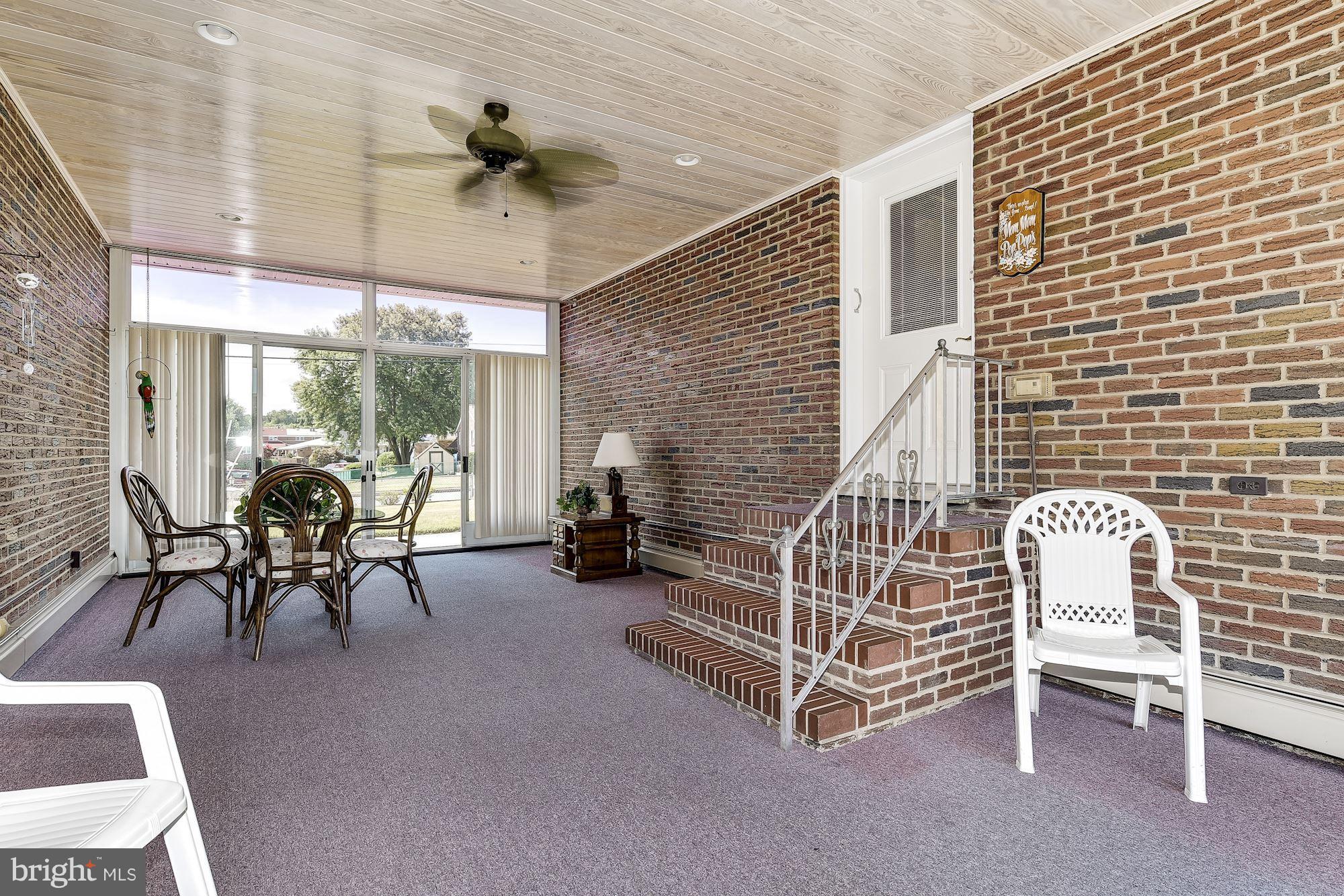7348 Manchester Road Baltimore, MD 21222 - Photo 22 of 26 a view of porch with seating space