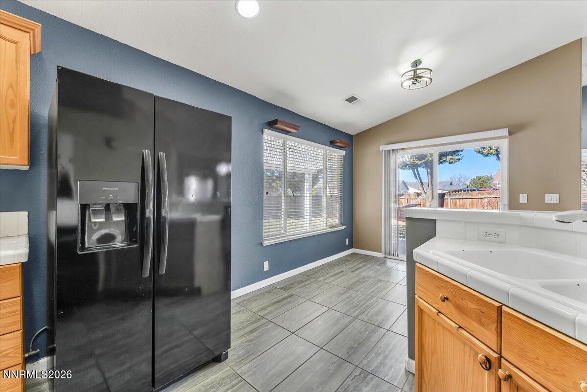 7663 La Ramba Drive Sparks, NV 89436 - Photo 12 of 27 a spacious bathroom with a shower and a sink