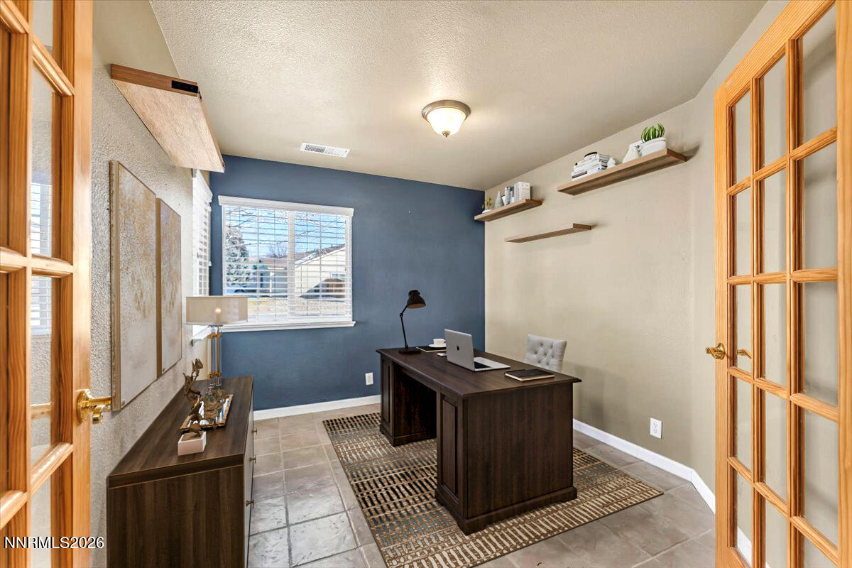 7663 La Ramba Drive Sparks, NV 89436 - Photo 18 of 27 a room with storage and utility