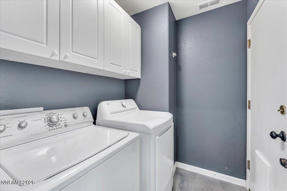 7663 La Ramba Drive Sparks, NV 89436 - Photo 20 of 27 a utility room with dryer and washer